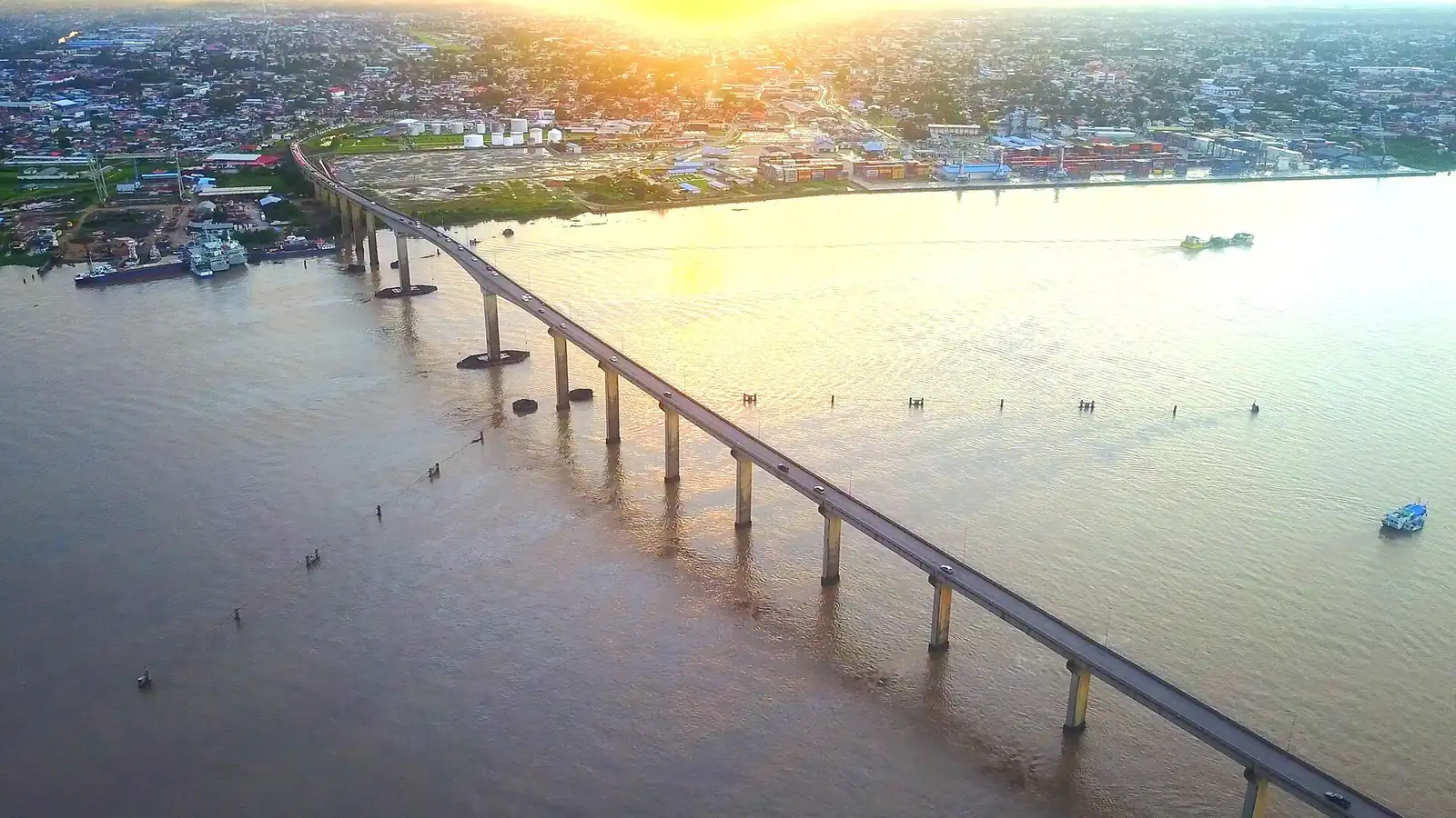 The Wijdenbosch Bridge over the Suriname River at golden hour